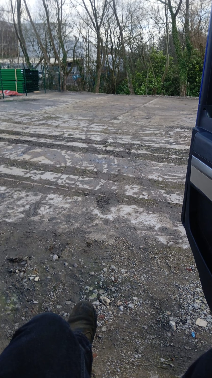 Existing uneven yard surface before groundworks for Easy Storage