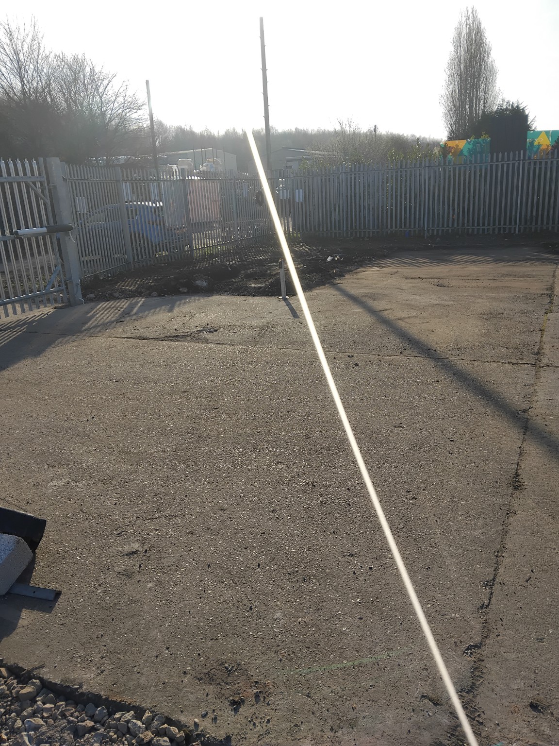 Completed groundworks beside the perimeter fence and entrance